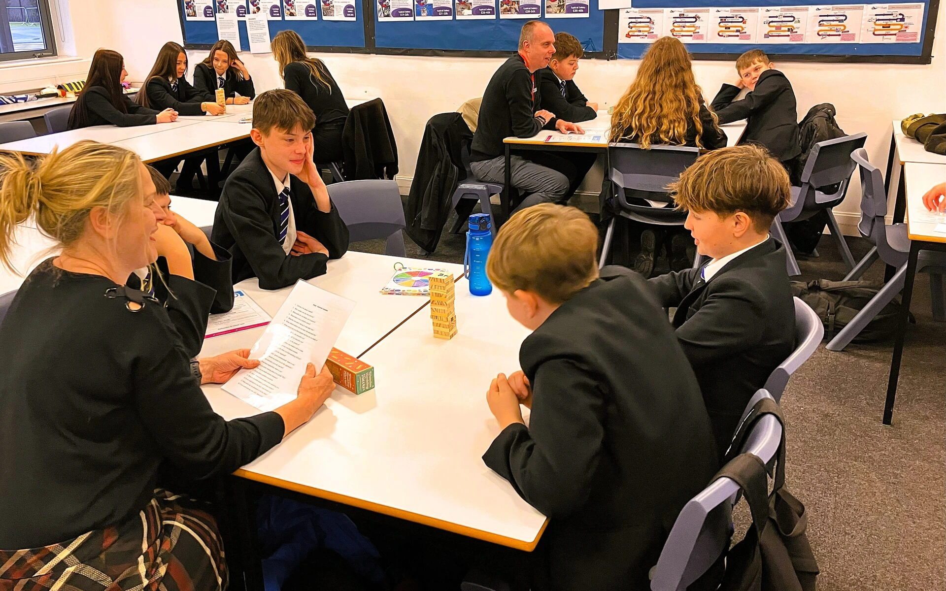 Group of students sitting at desks in a classroom